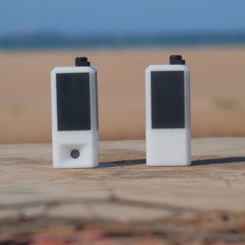 Obscape radar level gauge and time-lapse camera side by side at a coastal monitoring site.